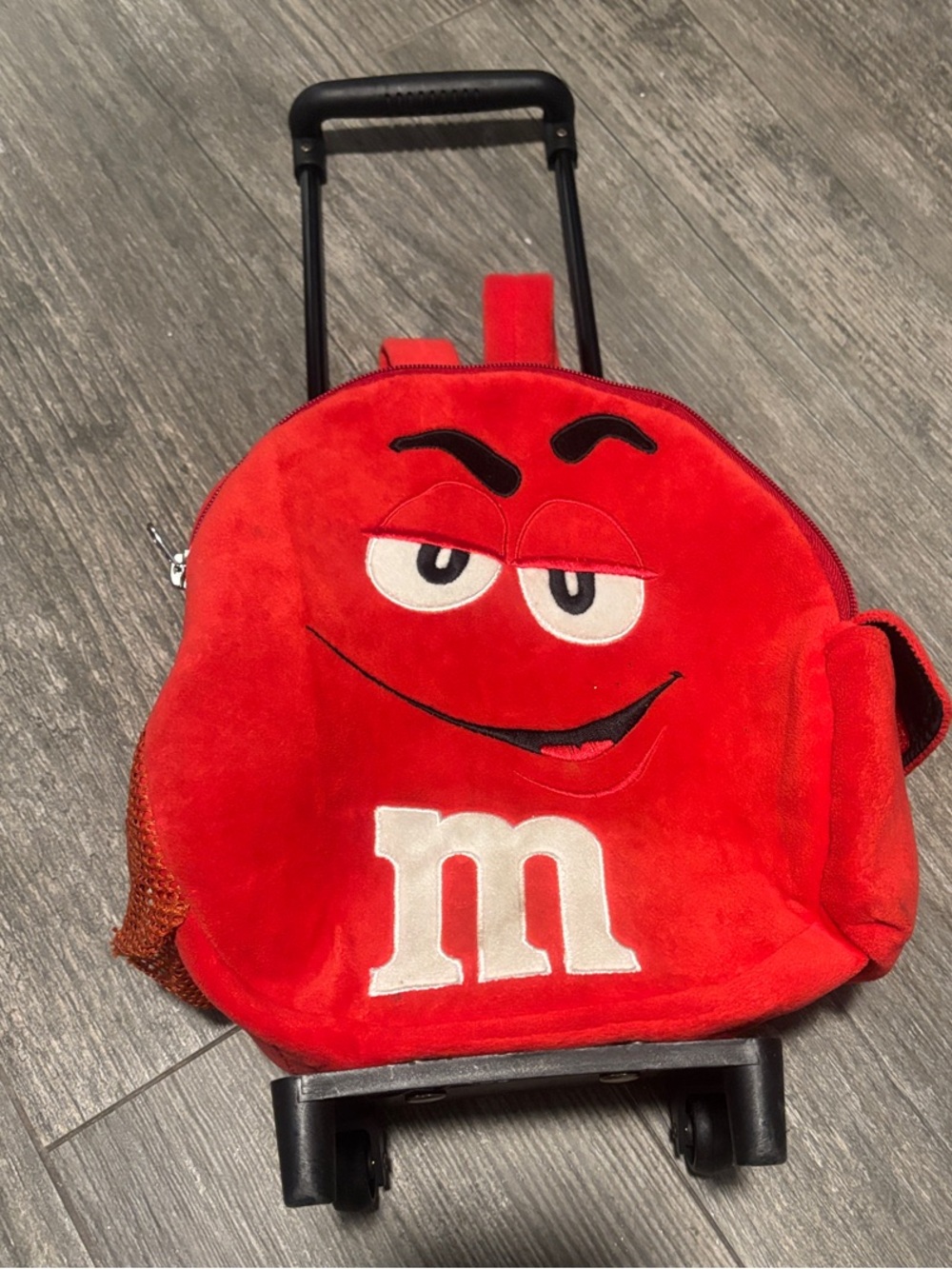 M&M'S Red Plush Rolling Backpack with Character Face